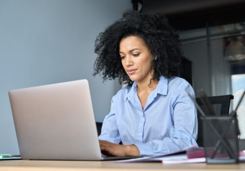 Woman working at a laptop